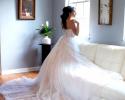 Bride in the light of sitting room.