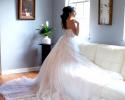 Bride in the light of sitting room.