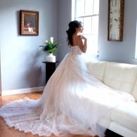 Bride in the light of sitting room.